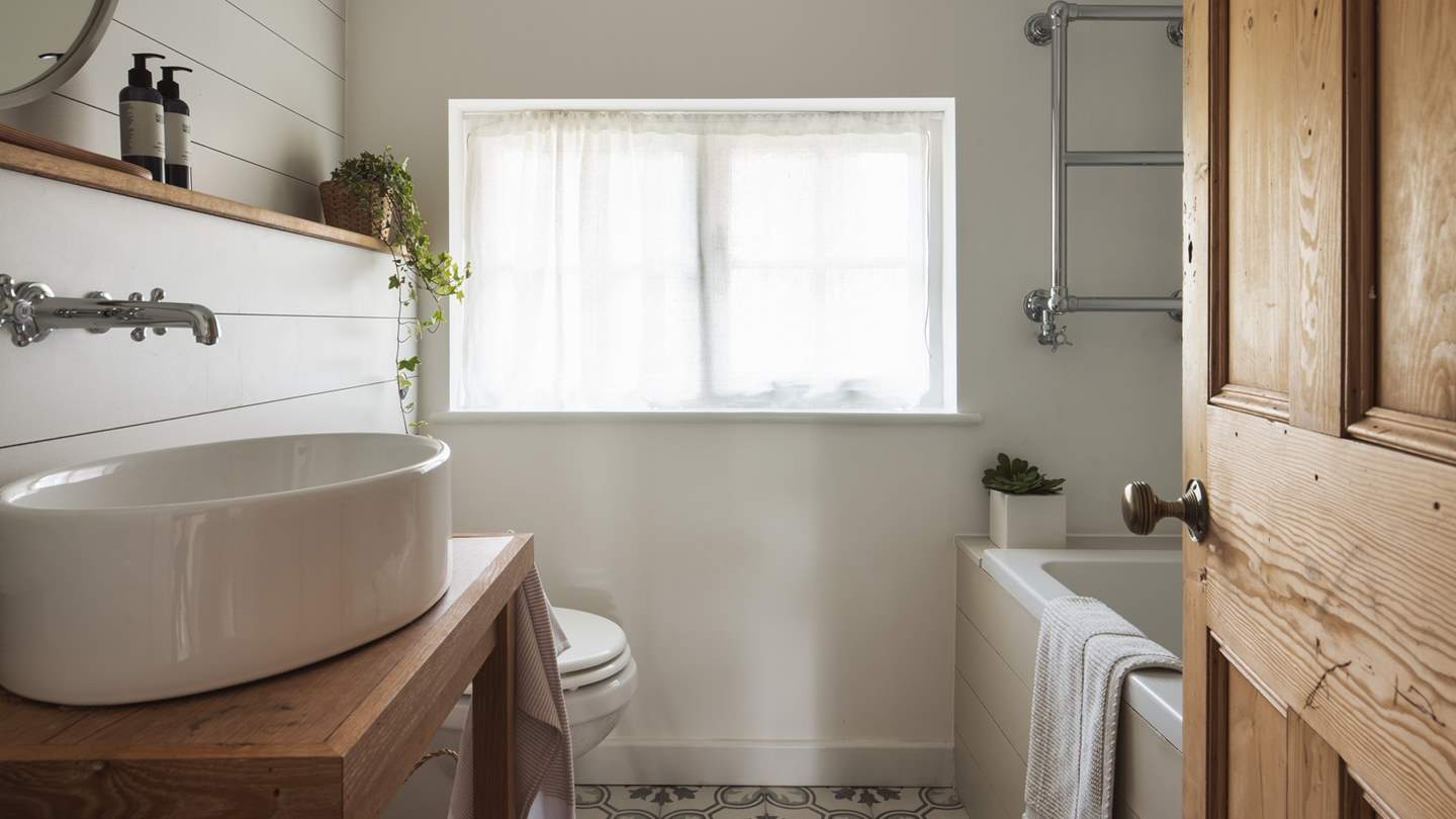 The family bathroom on the first floor with bath, shower and loo