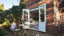The private patio for the ground floor bedroom - perfect for breakfast!