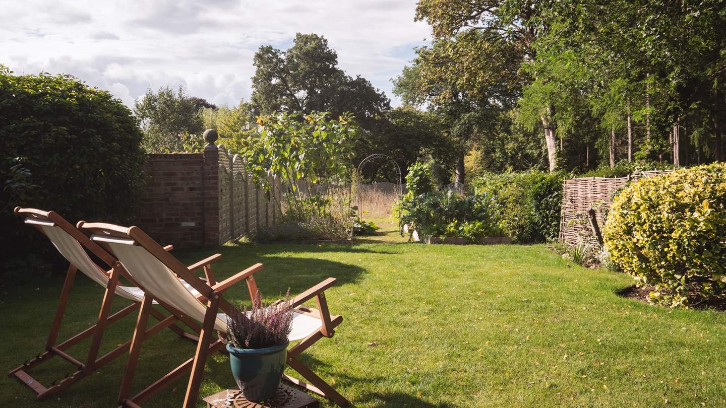The gorgeous country cottage garden is perfect for dogs and little ones to play in