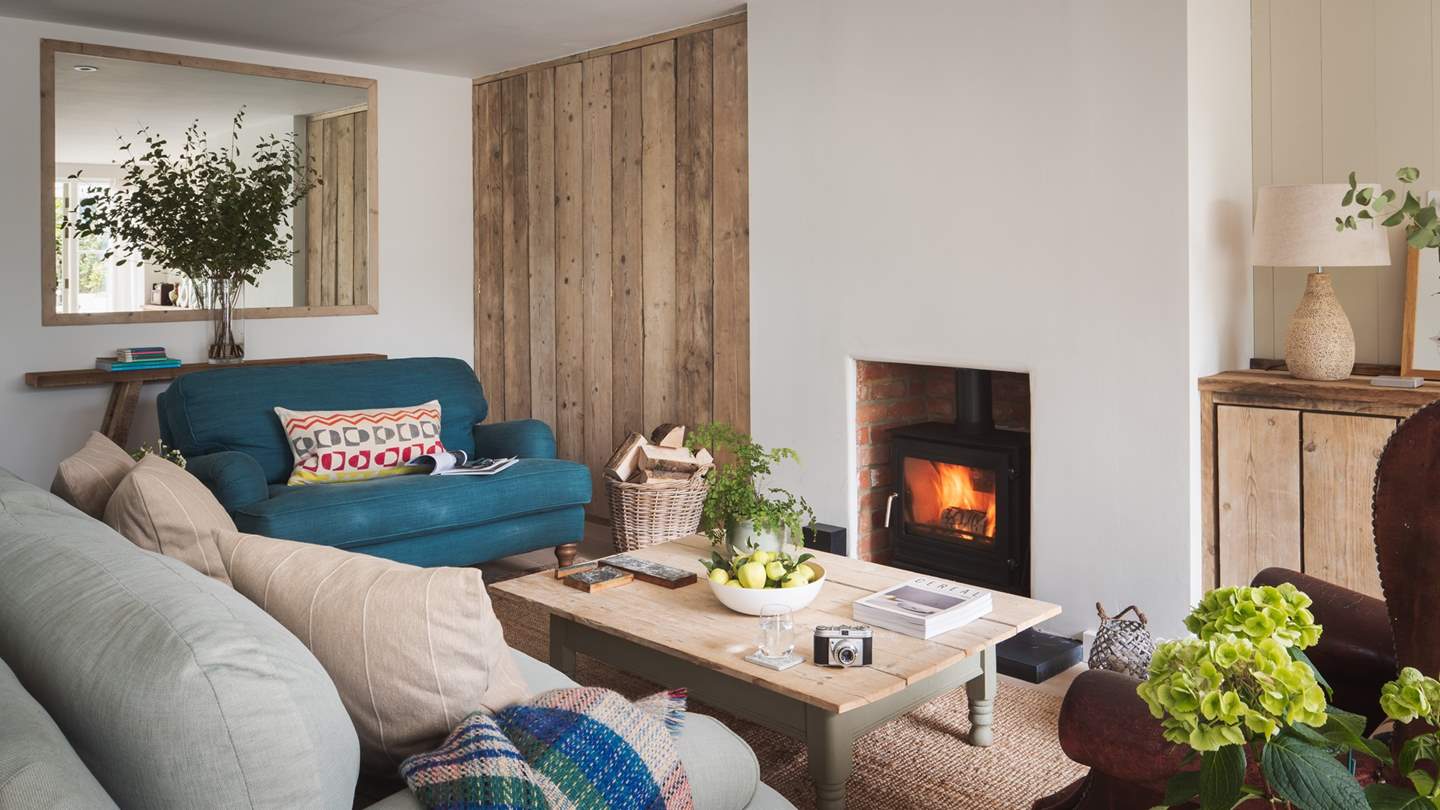 The chairs nestled around a crackling wood burner, oh-so-snug in cooler months