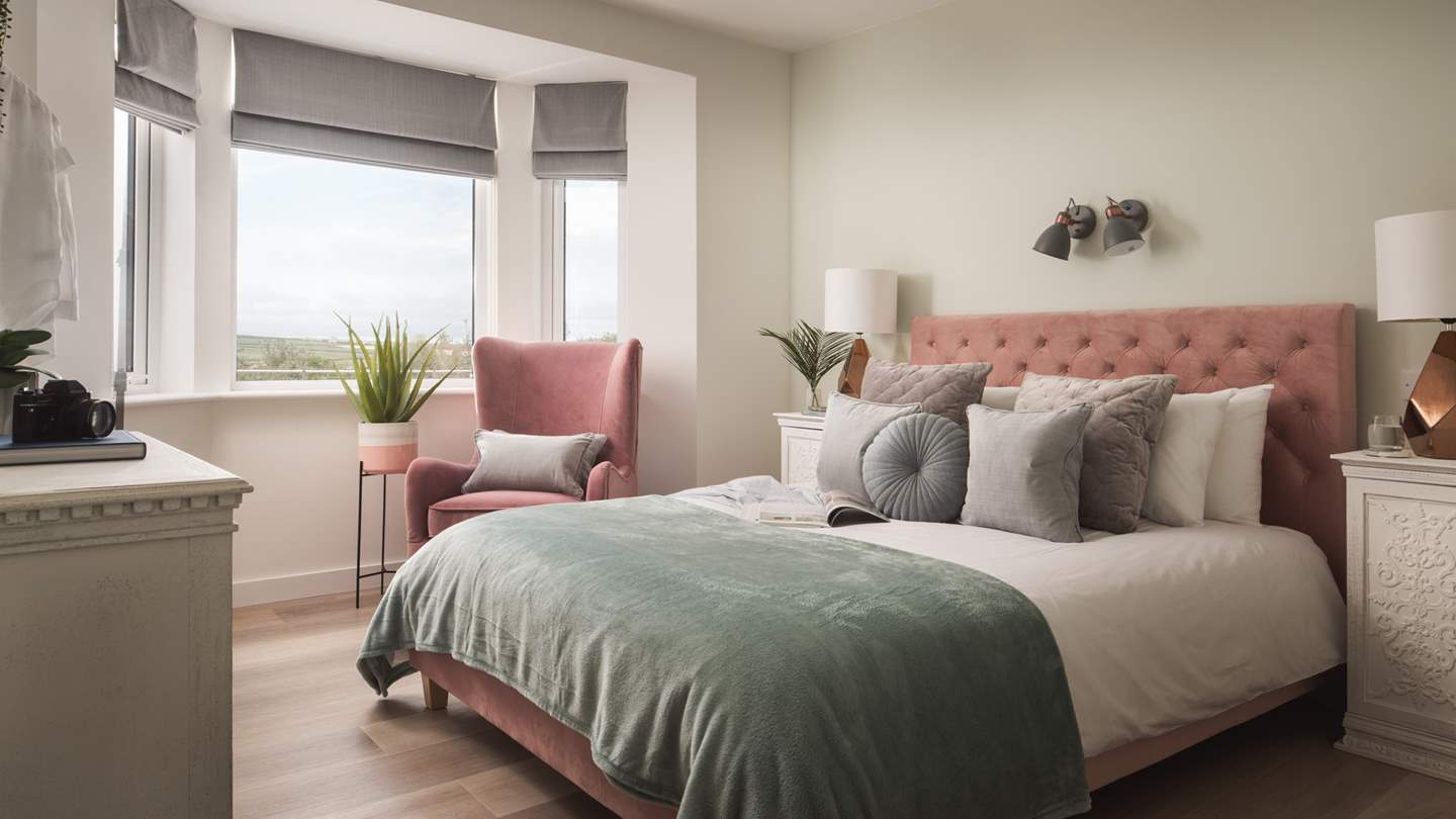 Diving into bed at the end of a lazy beach day is just a dream come true in this beautiful bedroom 