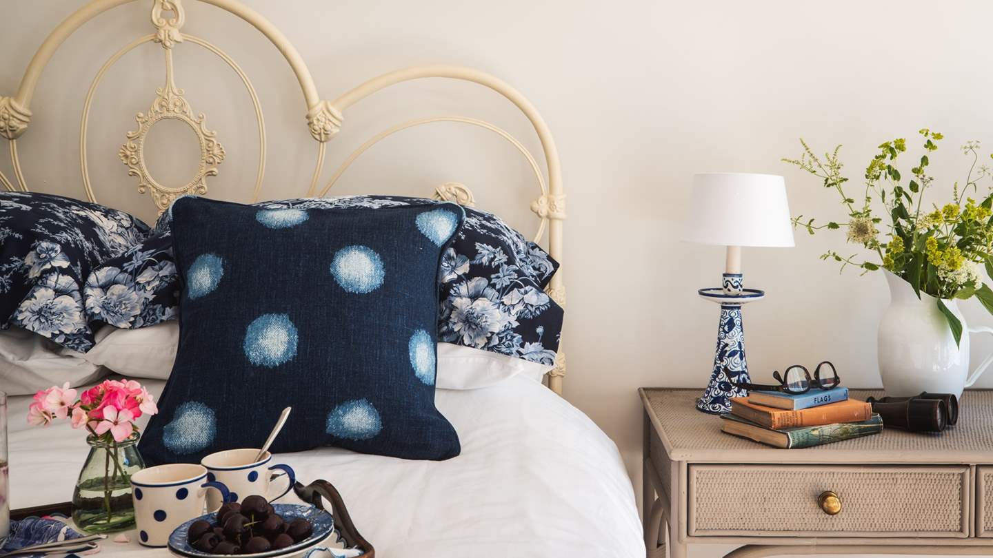 Both bedrooms are swathed in beautiful Yves Delorme linens, Brinkhaus pillows, sumptuous throws and a plethora of cushions