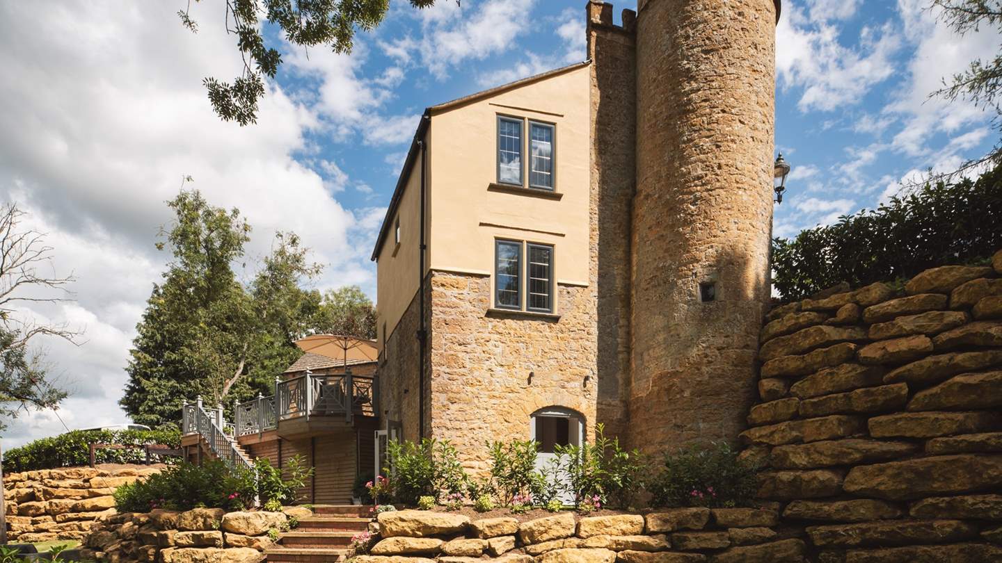 Dating from 1800, Sherborne Lodge frames the original Regency carriage drive and boasts two imposing castellated turrets