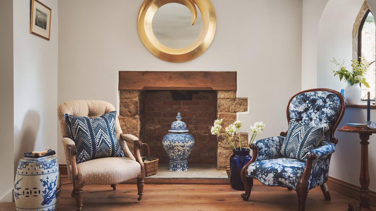 Take the turret staircase that winds up on oak boarded treads and exposed stone walls into the glorious sitting room