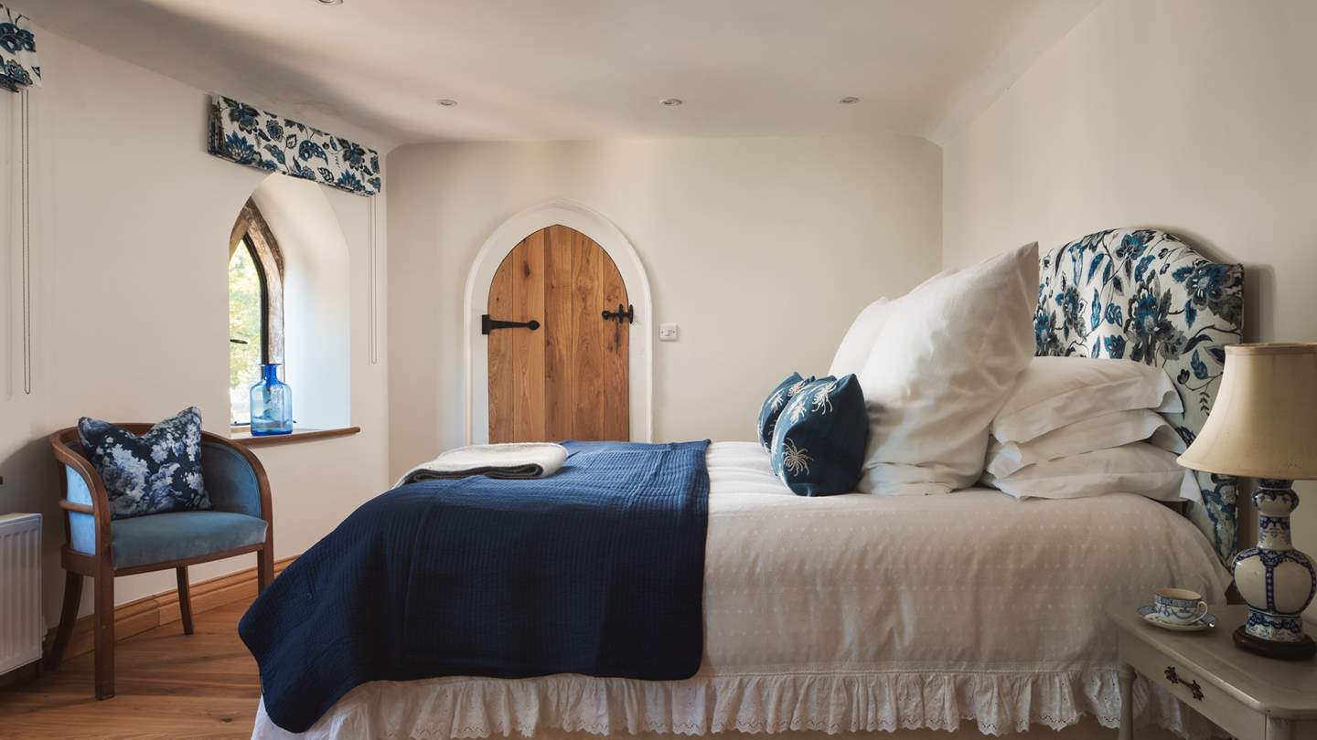 The turret staircase is an additional set of stairs to this suite, concealed behind castellated doors