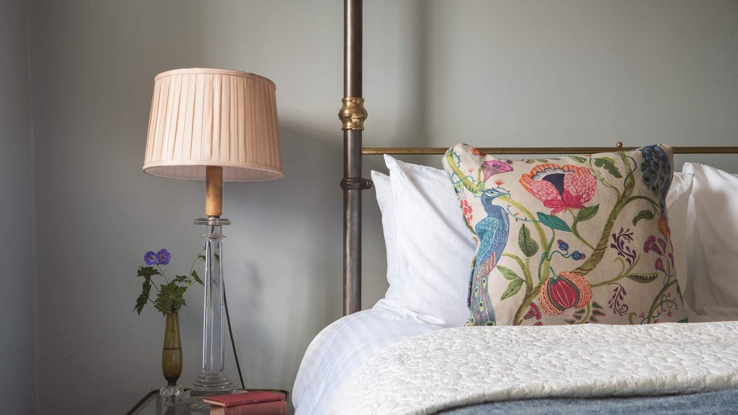 Sumptuous throws and cushions add a luxurious feel