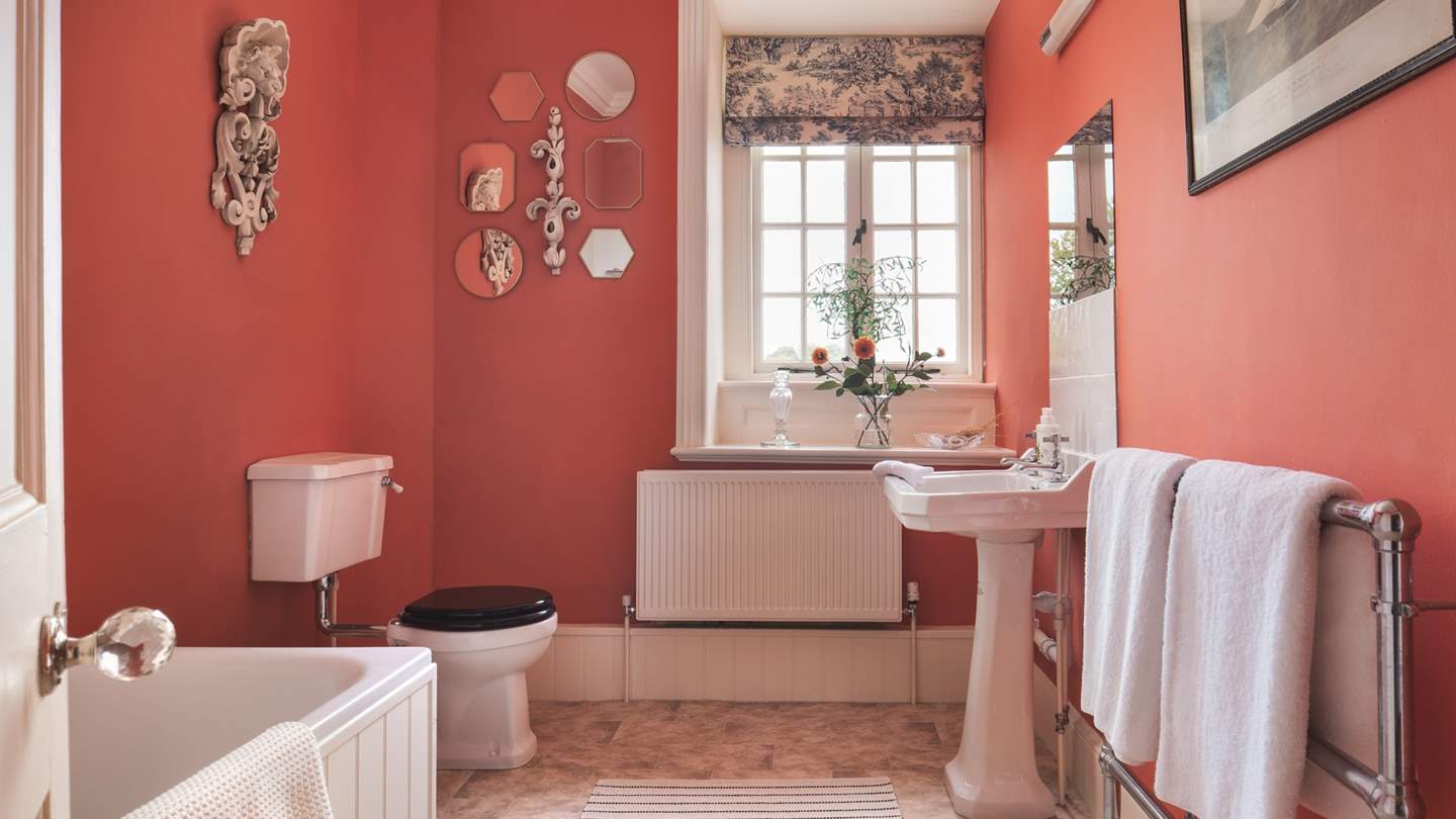 There's a family bathroom complete with a deep bath for long soaks with a shower overhead