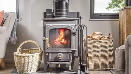 The cosy wood burner offers plentiful heat, making Woodlanders the perfect stay whatever time of year it is