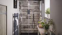 There’s also a large shower with rainfall head for refreshing pick-me-ups