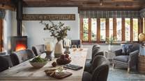 This is a lovely spot with the spacious country kitchen dining table for eight and the fabulous wood burning stove taking centre stage