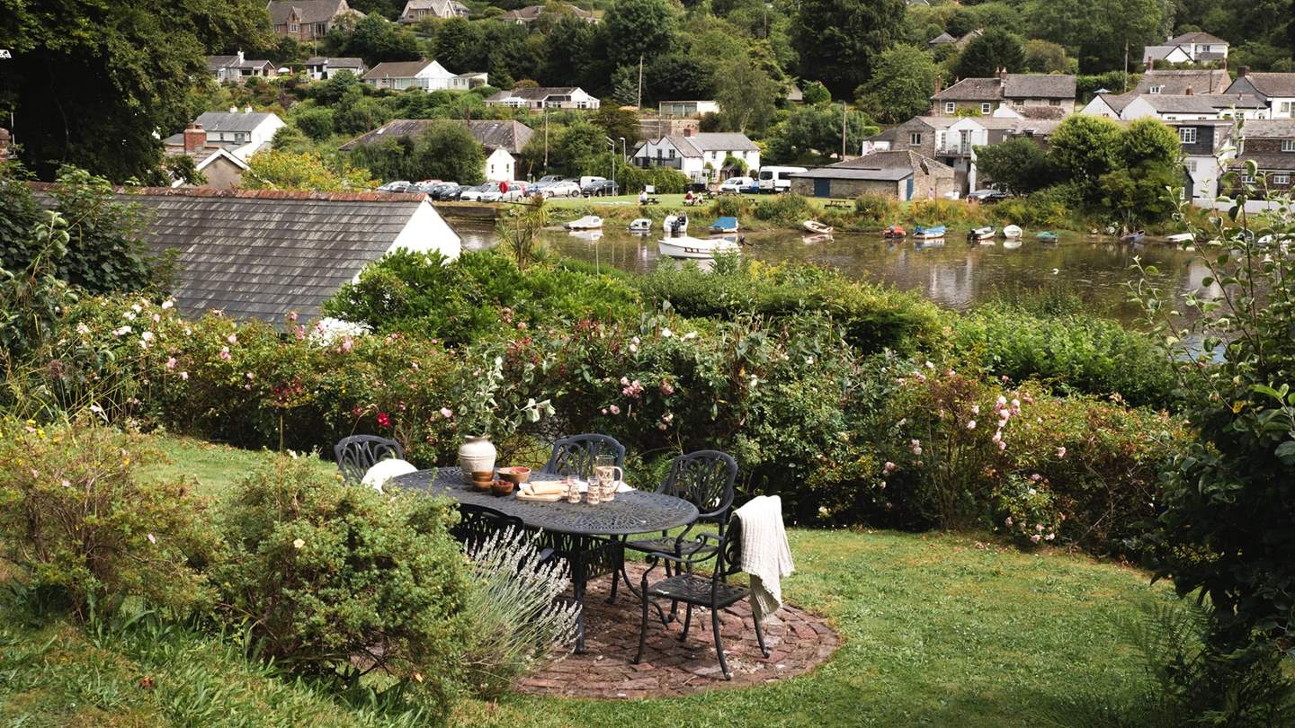 The dining table for six in the adorable rose garden 