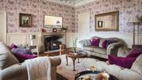 On the ground floor, you'll discover the decadent purple sitting room