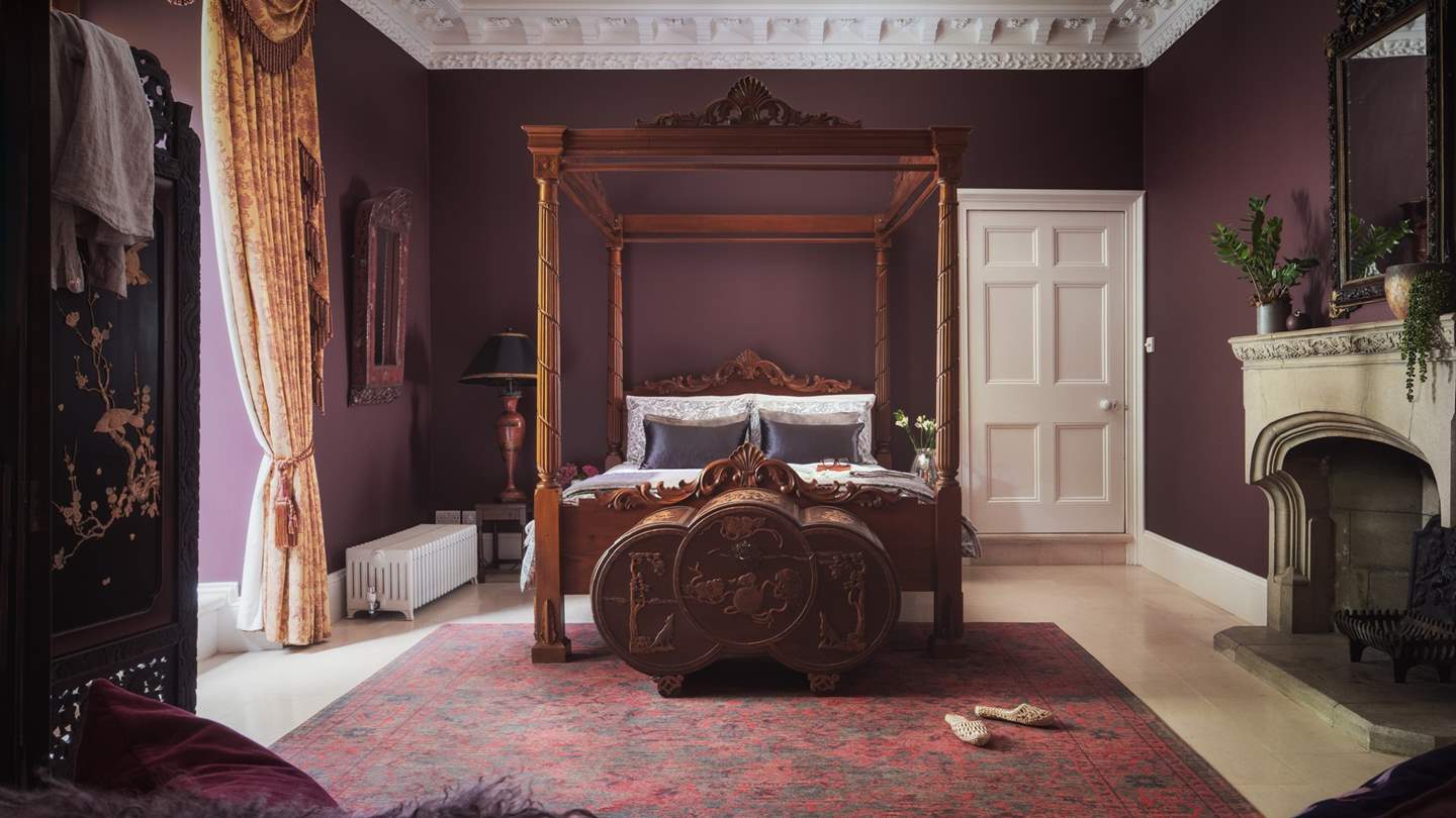 'Dove' is located on the ground floor and is an opulent bedroom in shades of rich berries and wine