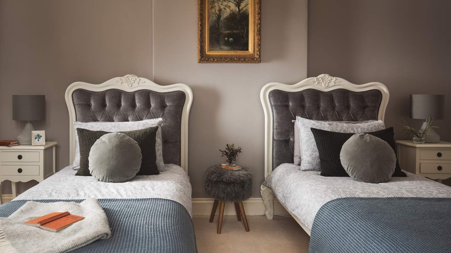 'Swan' is a darling twin bedroom situated on the first floor with glorious views over the garden