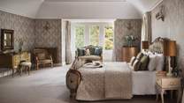 The resplendent 'Bee' room in shades of cream and gold