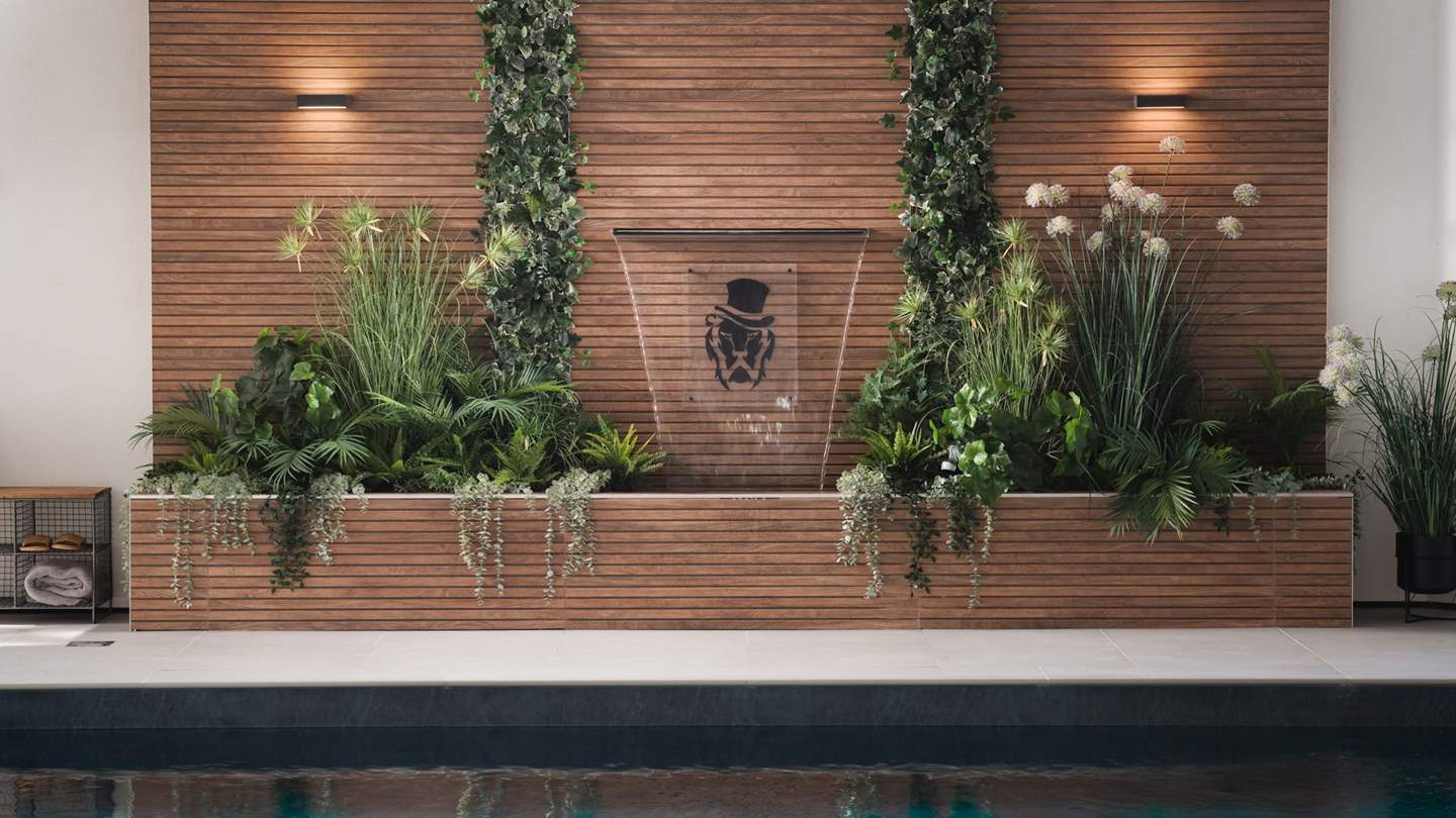 Enjoy the relaxing sounds of the waterfall in this oh-so-calming oasis 