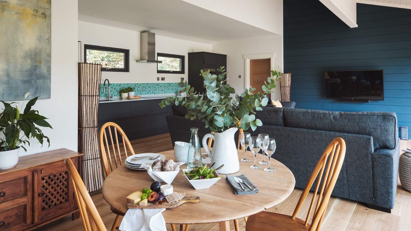 The open-plan living and dining area is perfect for couples and families alike