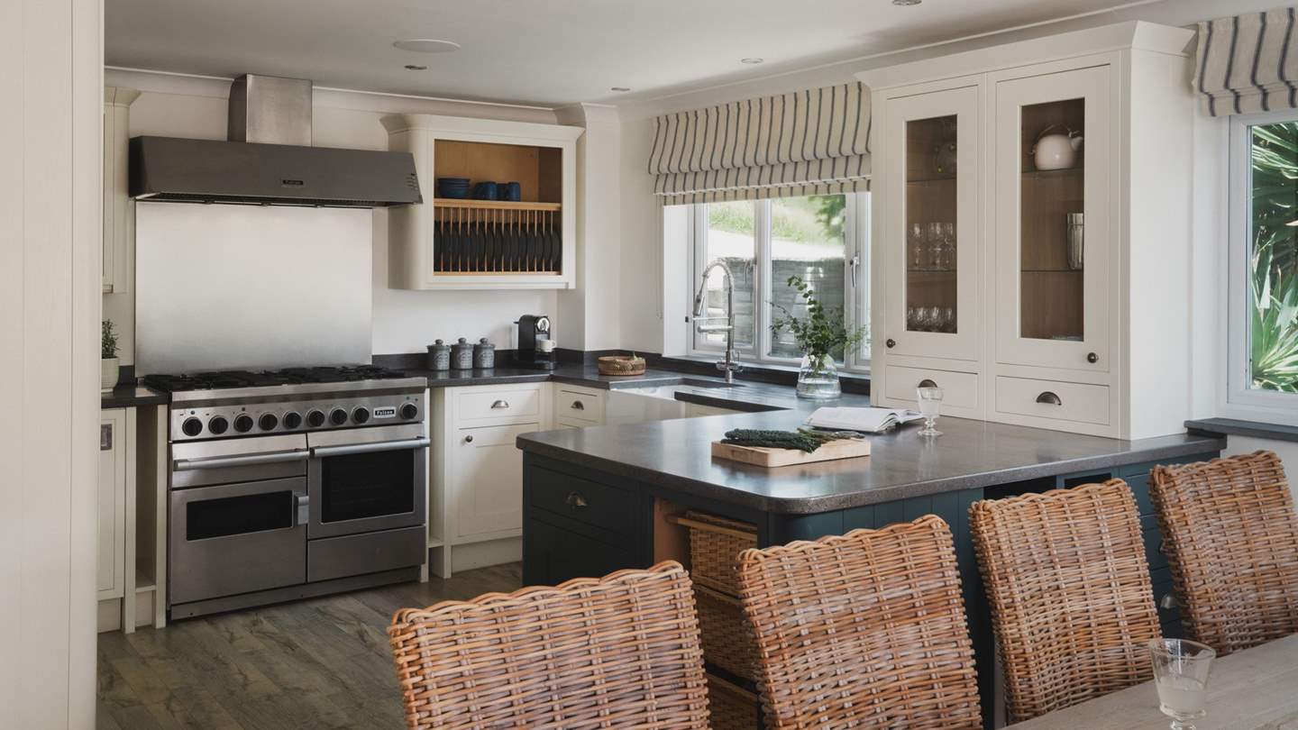 The kitchen is fully equipped with everything you could need to craft feasts for your loved ones, including a Falcon range cooker