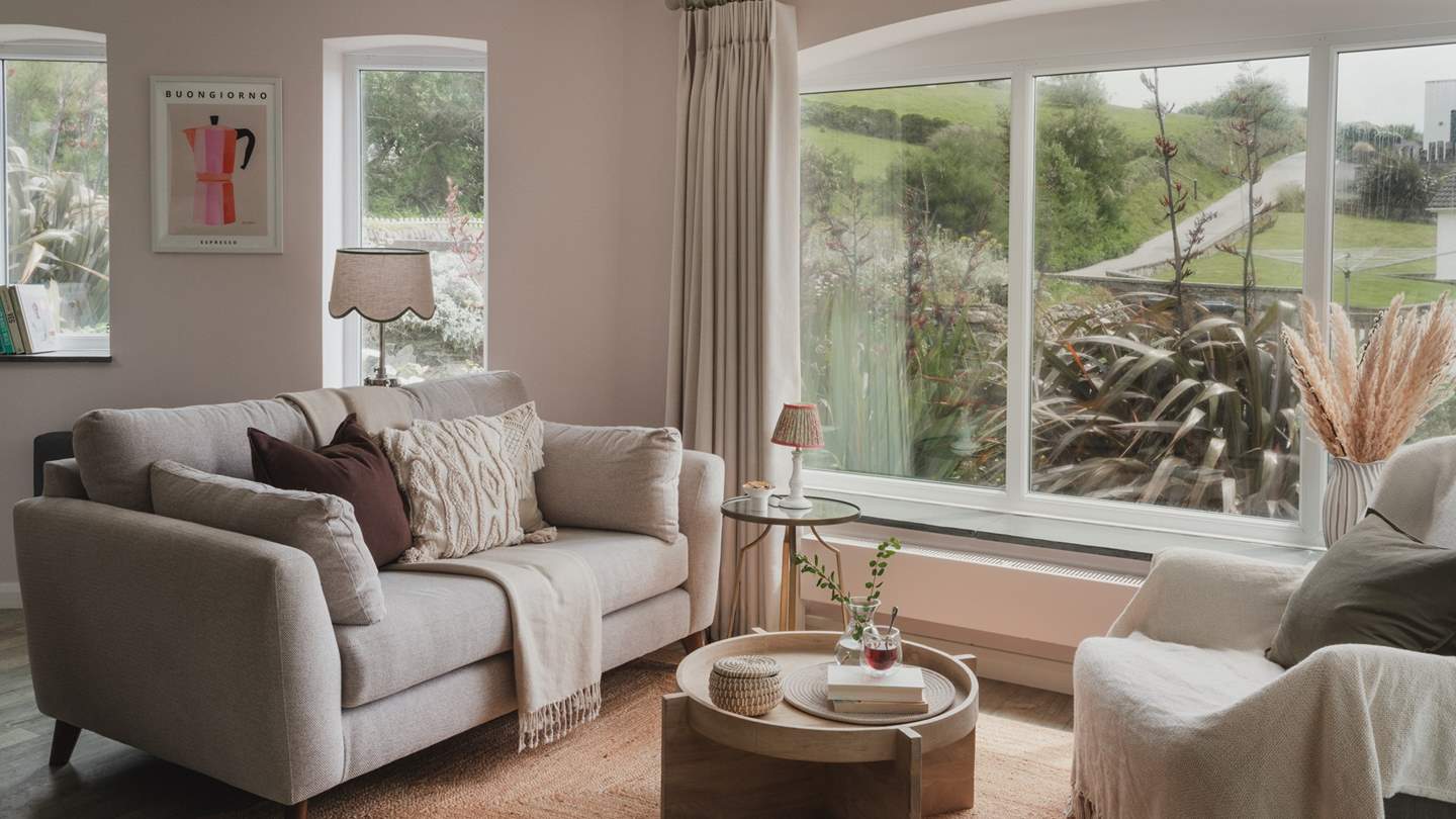 An additional seating area lies beside the dining table