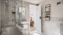 The en suite boasts both a bath and an overhead shower - the best of both worlds!
