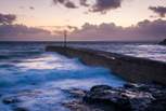 The iconic and often dramatic pier at Porthleven is a photographer's dream!