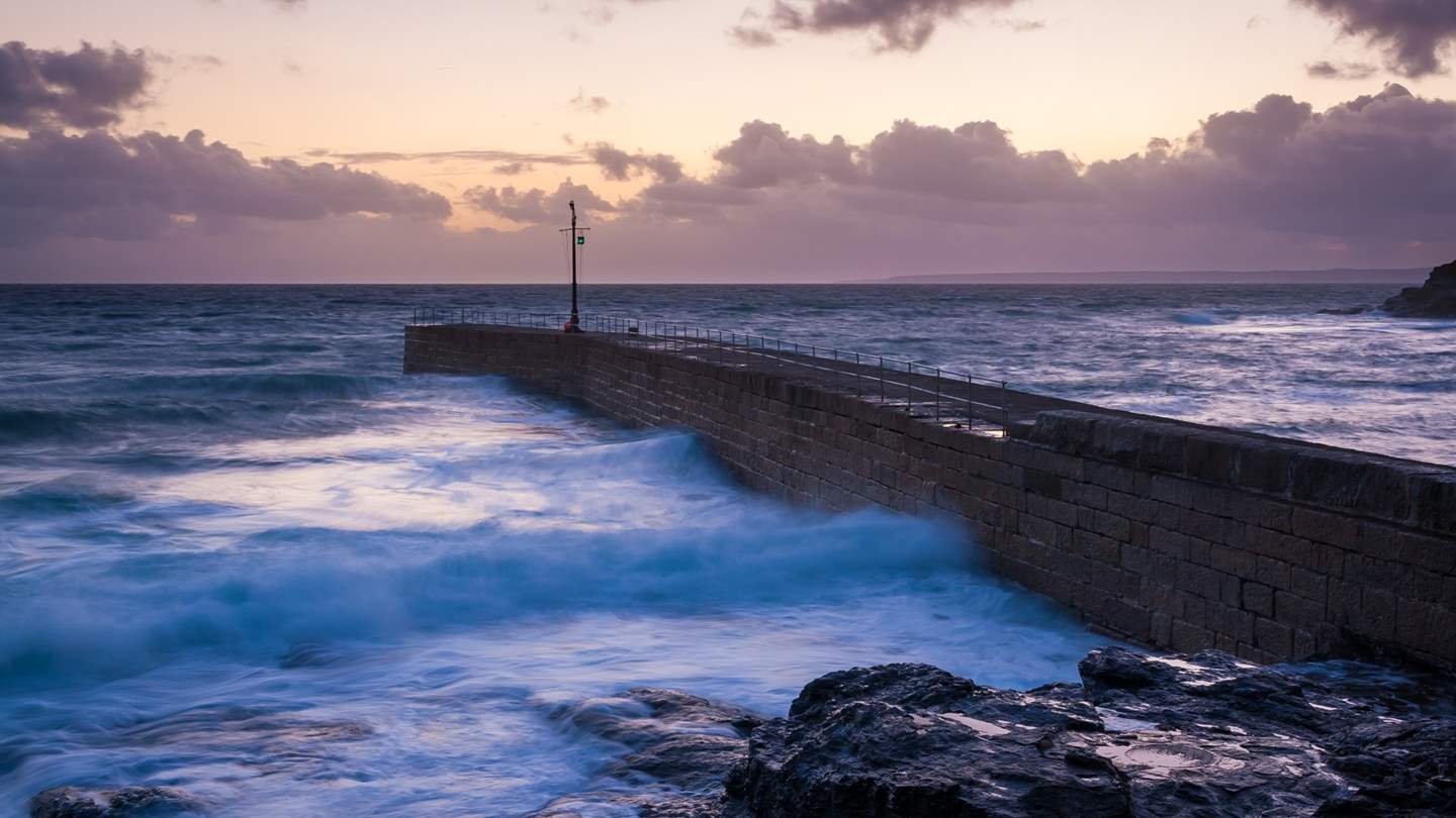 The iconic and often dramatic pier at Porthleven is a photographer's dream!