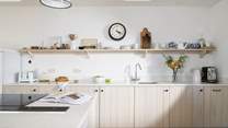 Diffused with soft light, the kitchen is an interior designer's dream