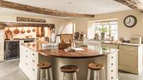 The stunning, spacious kitchen is as perfect example of a traditional farmhouse but with all the modern luxuries