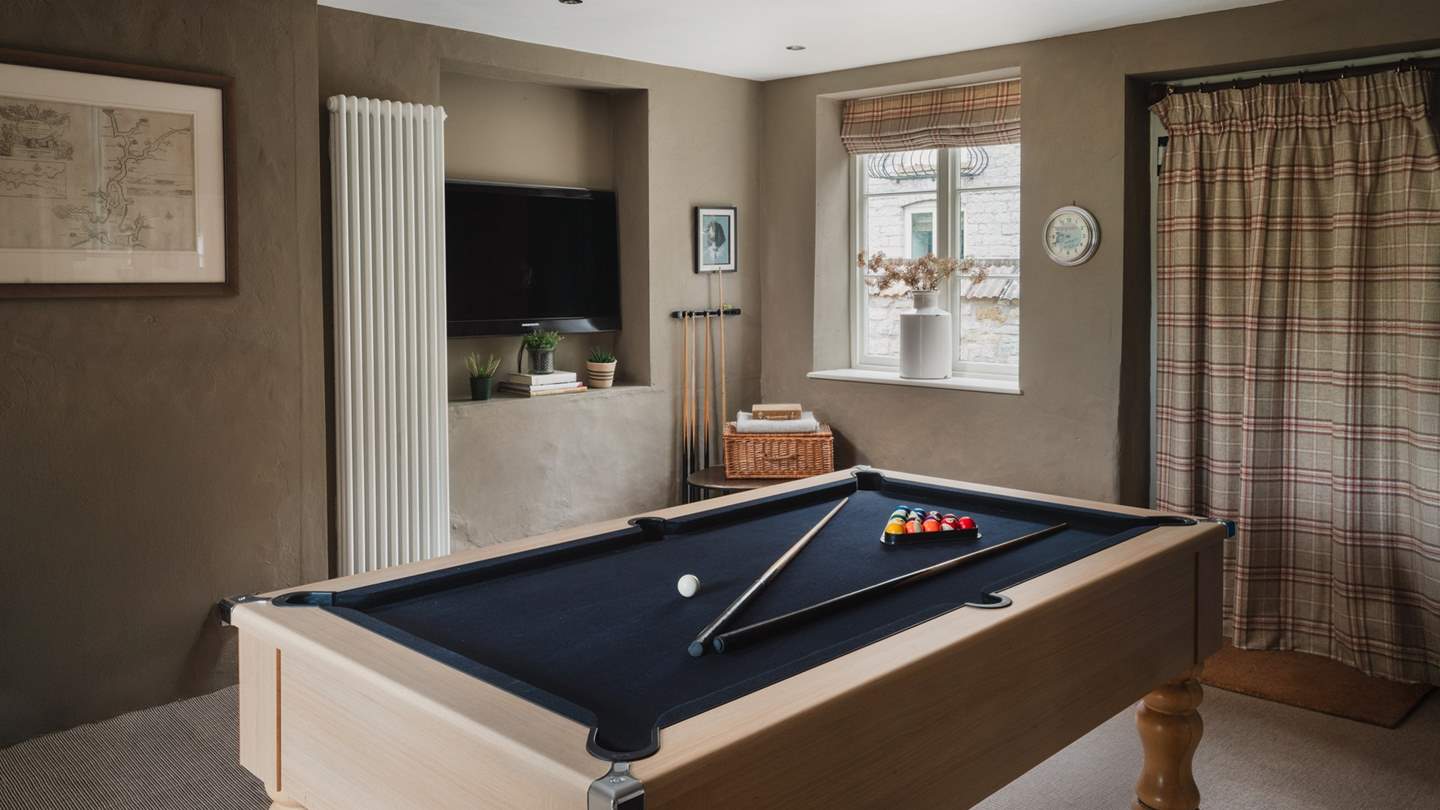 Discover the games room, complete with a Smart TV, pool table, table tennis and dart board