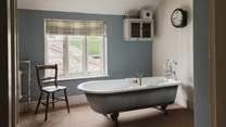 With use of the family bathroom that lies across the hallway, which has a large roll top bath plus a separate shower