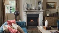 Let the warmth of the roaring fire keeping you company as you sit and chat over drinks