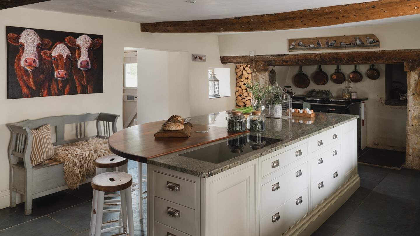 With a large kitchen island to gather around 