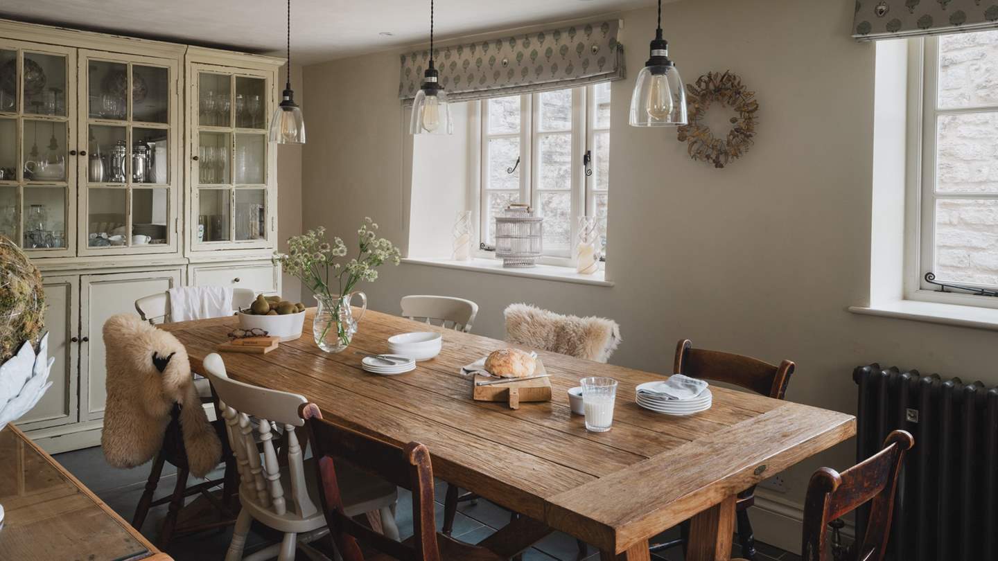 A rustic table seats up to eight