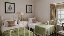 The second bedroom has 3ft wrought iron twin beds and are perfect for little ones