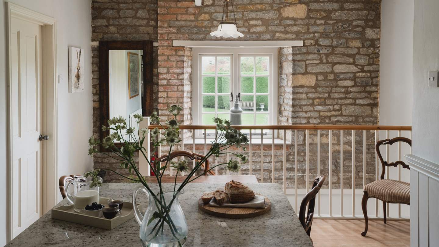 Exposed stone walls and pretty interior details are the perfect backdrop to enjoy slow mornings