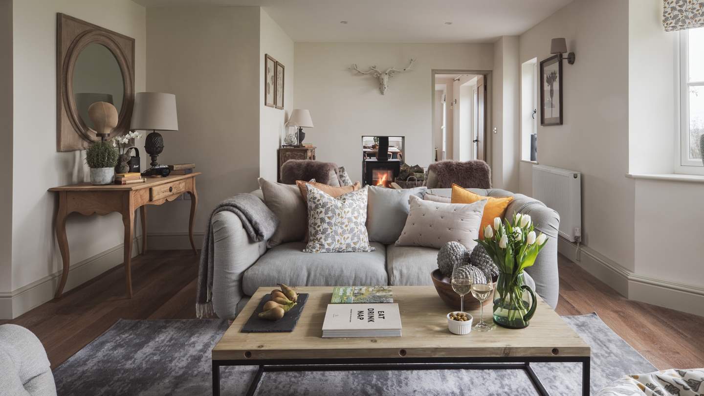 In the sitting room, you'll find two large, plumptuous Loaf sofas on which to sprawl and gaze out of the bay windows