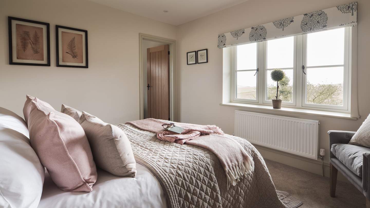 Pretty countryside and distant sea views await...