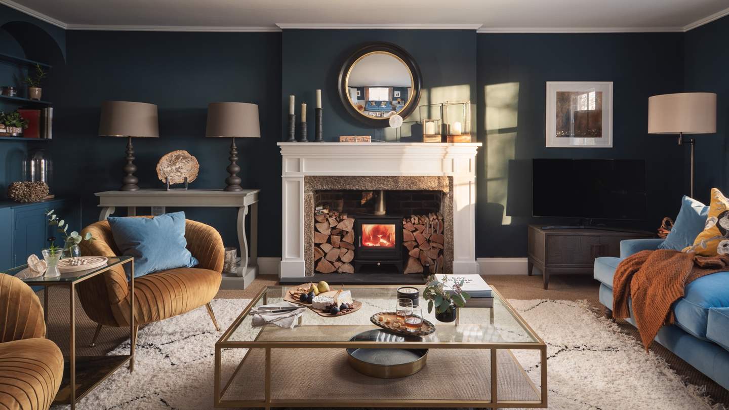 The wonderfully cosy sitting room just invites you to hunker down and curl up in front of the wood burner