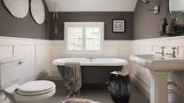 This lovely bathroom lies next to the master bedroom