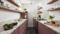 The galley kitchen offer plenty of space for rustling up meals for you both