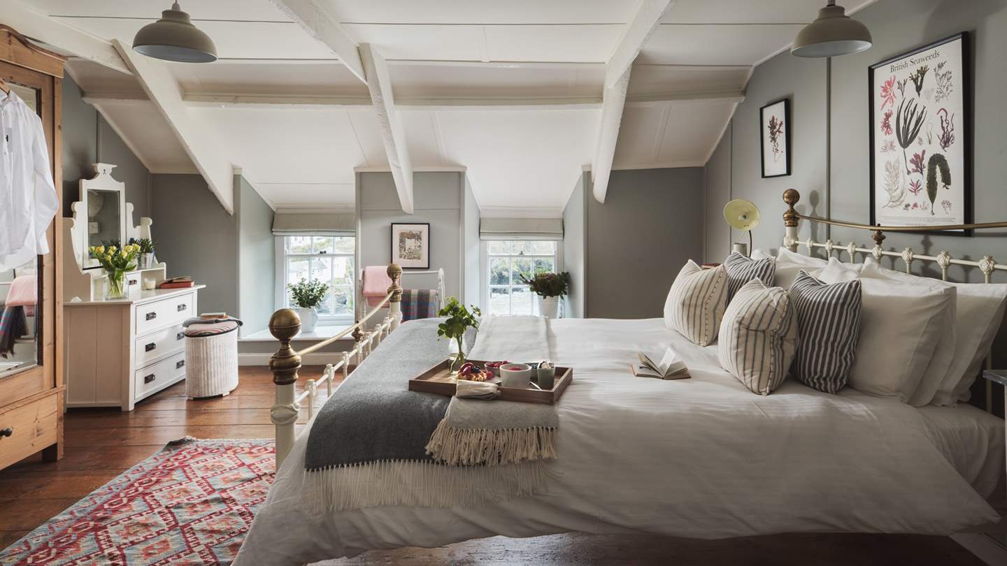 The sumptuous brass bed is so inviting, you'll not want to get up in the morning!