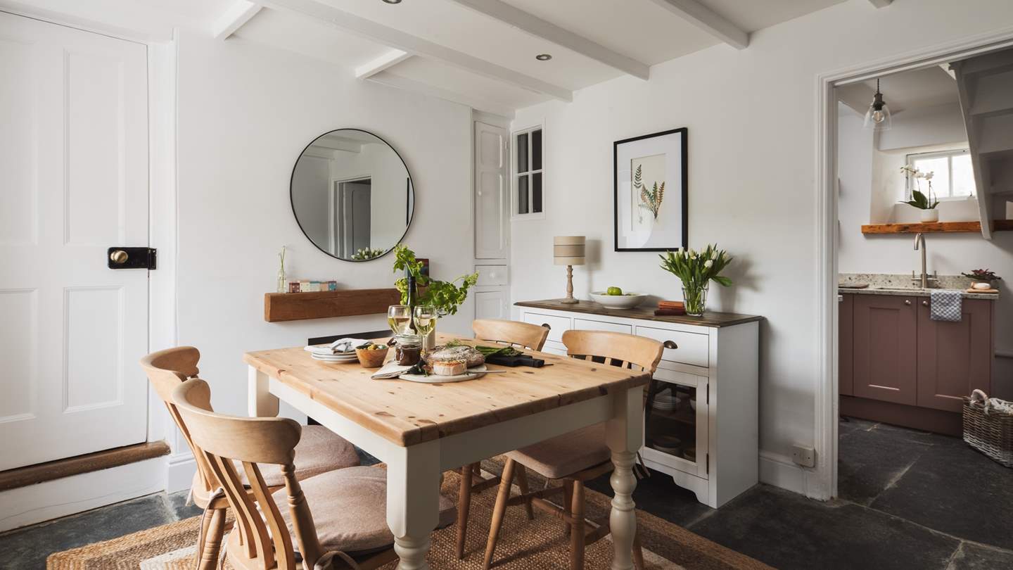 The lovely dining room is made for long luncheons and decadent dinners