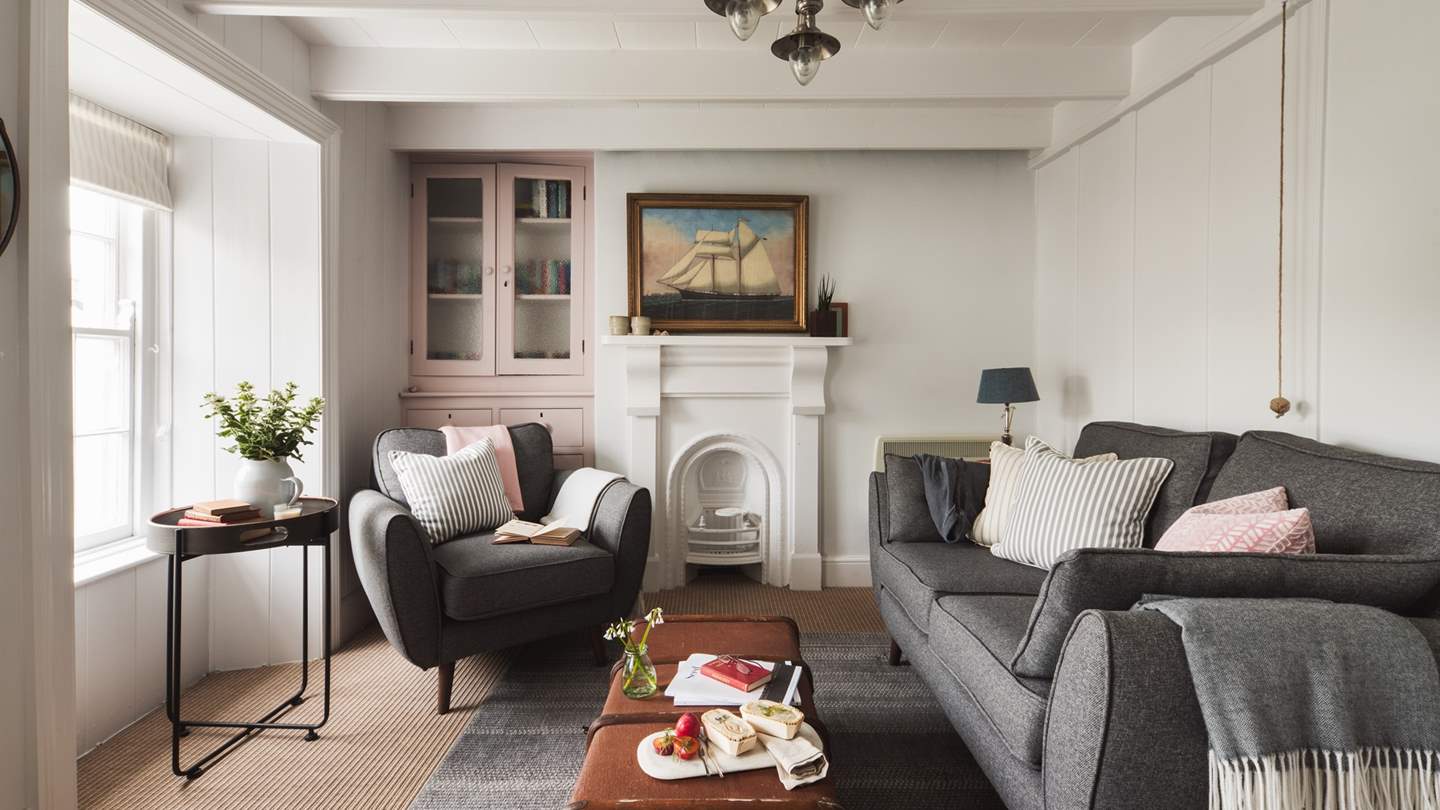 There's plenty of space to sprawl out in the sitting room - we just love the unique coffee table