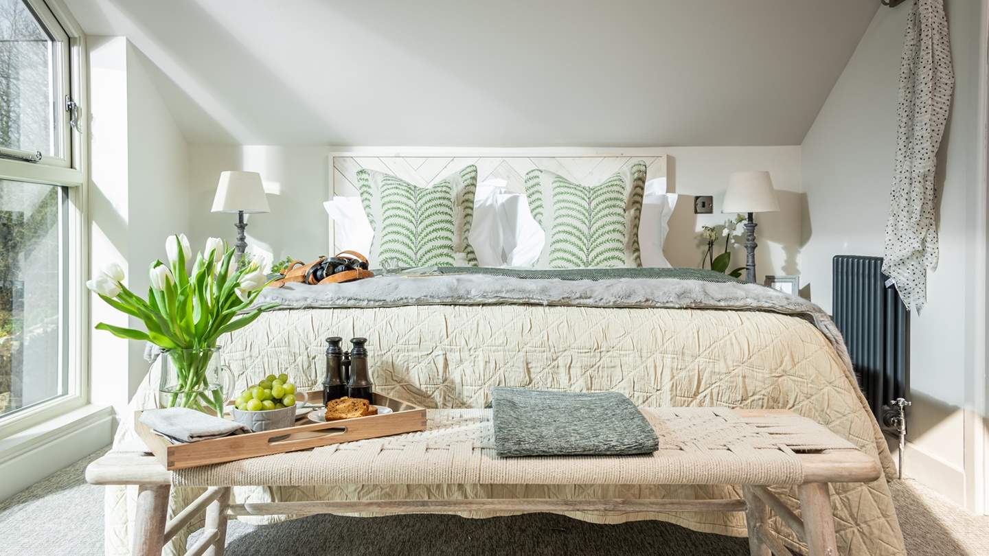 Swathed in sumptuous bedding, throws and cushions, you're guaranteed a blissful nights' sleep