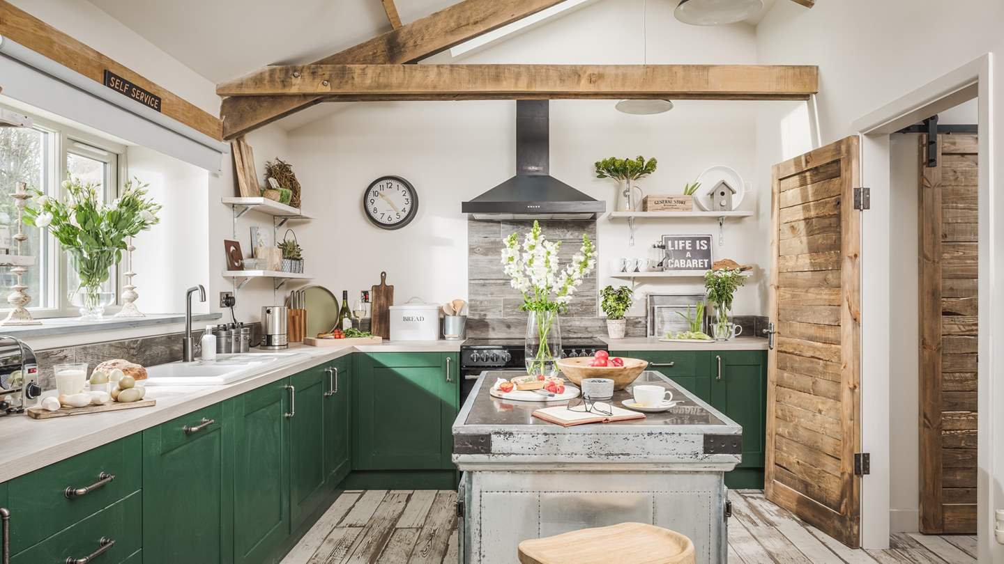 The impressive kitchen is not only beautiful to look at but fully equipped too