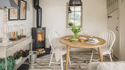 Nestled by the flickering wood burner, meals will be super cosy during cooler months