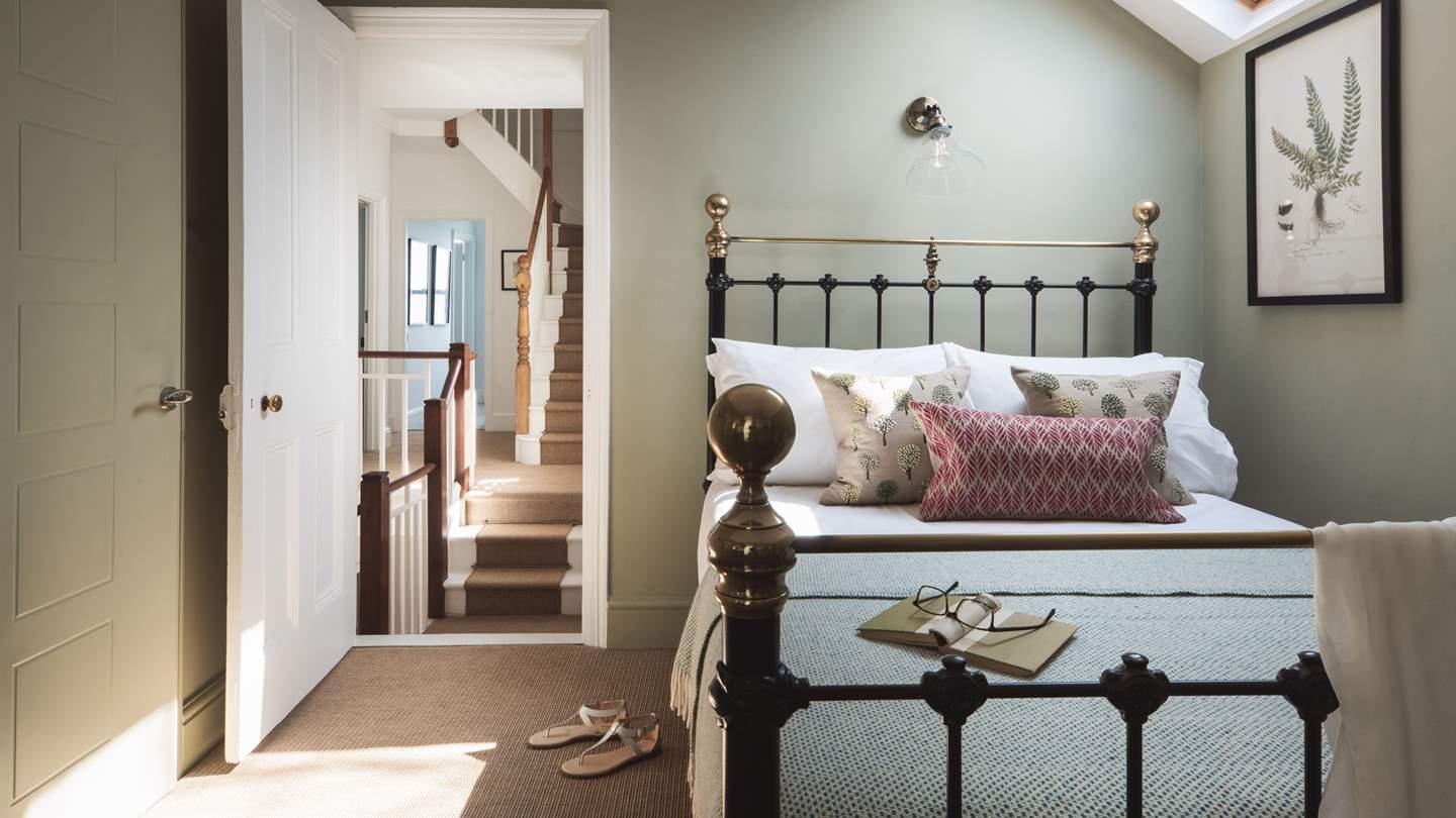 Take the stairs up to the first floor and you'll find the lovely double bedroom, complete with en suite shower room