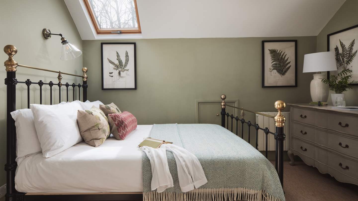 We love the gentle sage greens used in this pretty room