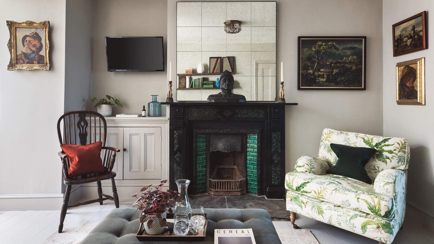 With lots of original features such as this fireplace, Atlinto is full of vintage charm