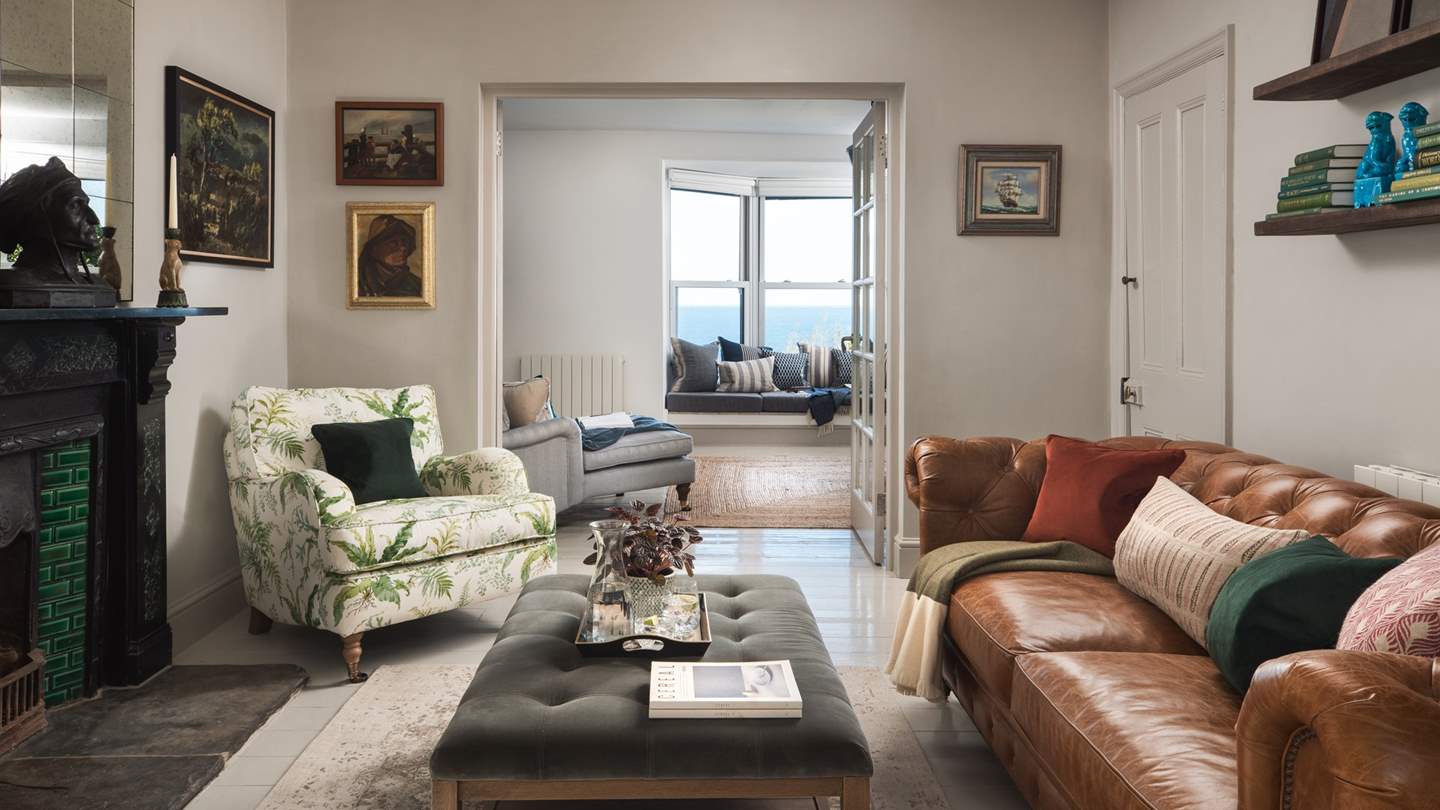 The 'Winter' room is seriously cosy with a large leather sofa for more intimate get-togethers